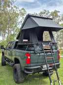 On The Horizon 1.4X rooftop tent open on a ute with the ladder down at a bush camp