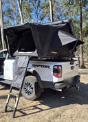 Hanging gear bag clipped to the side of the ute tub