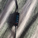 The inline light controller inside the On The Horizon 1.4, with brightness up and down, a mode button for the six colour settings, and power
