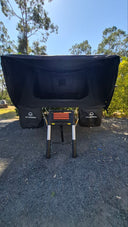 The 1.9 Penthouse open from the rear with the ladder down and both hanging gear bags fitted
