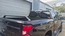 Tub rack arms sitting low over the Silverado 1500 tub